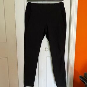 Black,lightweight , very comfortable pants with pockets.